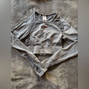 Gray and pink Gymshark sports Gymshark athletic crop top.